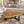 Laden Sie das Bild in den Galerie-Viewer, Akazie-Baumscheibe-Couchtisch (110 × 100 × 43 cm, 9 cm starke Platte) mit herzförmiger Wolken-Naturform, echter Baumkante und honigbrauner Maserung, Massivholz-Unikat für Wohnzimmer mit Ecksofa oder L-Sofa in der Schweiz
