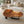 Load image into Gallery viewer, Couchtisch aus Akazie-Baumscheibe mit markanter Holzmaserung (Suarholz, ca. 107 x 90 x 43 cm, 8 cm starke Platte) und Naturkante, mittelgroßes Massivholz-Unikat für asiatisch inspiriertes Wohnzimmer, Loft oder Lounge in der Schweiz

