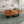 Laden Sie das Bild in den Galerie-Viewer, Couchtisch aus Akazie-Baumscheibe mit markanter Holzmaserung (Suarholz, ca. 107 x 90 x 43 cm, 8 cm starke Platte) und Naturkante, mittelgroßes Massivholz-Unikat für asiatisch inspiriertes Wohnzimmer, Loft oder Lounge in der Schweiz

