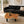 Load image into Gallery viewer, Salontisch aus massiver Akazie-Baumscheibe (95 x 92 x 43 cm, 8 cm starke Platte) mit Naturkante und organischer Form, kompakter Naturholz-Couchtisch im asiatisch inspirierten Stil für kleine Wohnzimmer in der Schweiz
