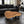Laden Sie das Bild in den Galerie-Viewer, Akazie-Baumscheibe-Couchtisch (110 × 100 × 43 cm, 9 cm starke Platte) mit herzförmiger Wolken-Naturform, echter Baumkante und honigbrauner Maserung, Massivholz-Unikat für Wohnzimmer mit Ecksofa oder L-Sofa in der Schweiz
