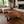 Load image into Gallery viewer, Wohnzimmertisch aus massiver Akazien-Baumscheibe (100 x 90 x 43 cm, 8 cm starke Platte) mit Baumkante und organischer Naturform, naturbelassenes Massivholz-Unikat als Couchtisch für L- oder U-Sofa im Schweizer Wohnzimmer
